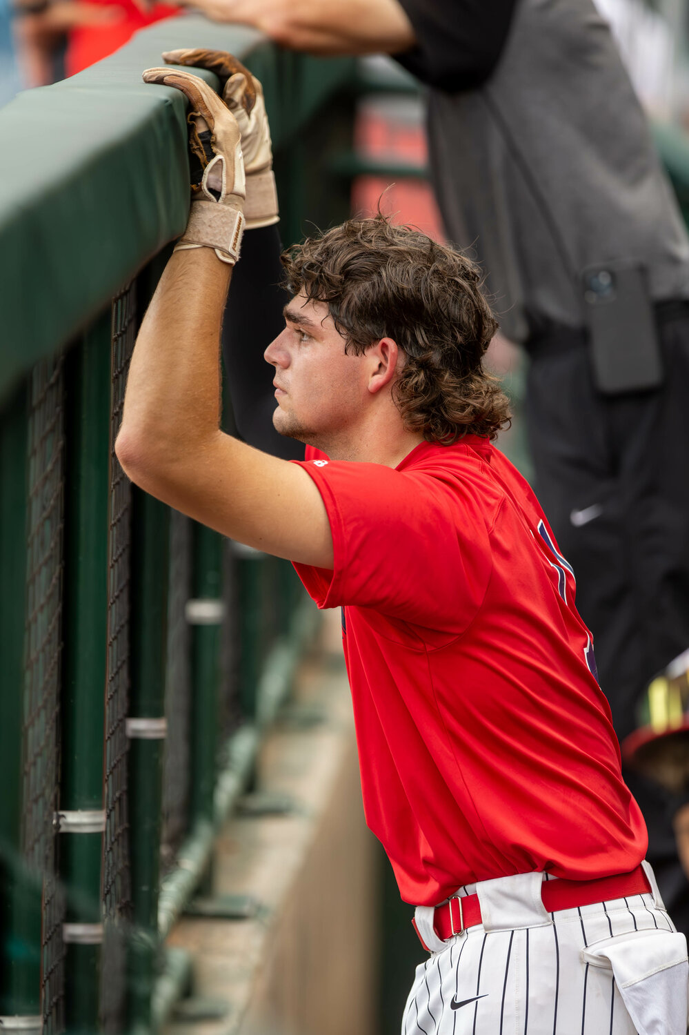 Cole Kaase watches from the dugout during the GHBCA Seniors All-Star game at Constellation Field in Sugar Land.